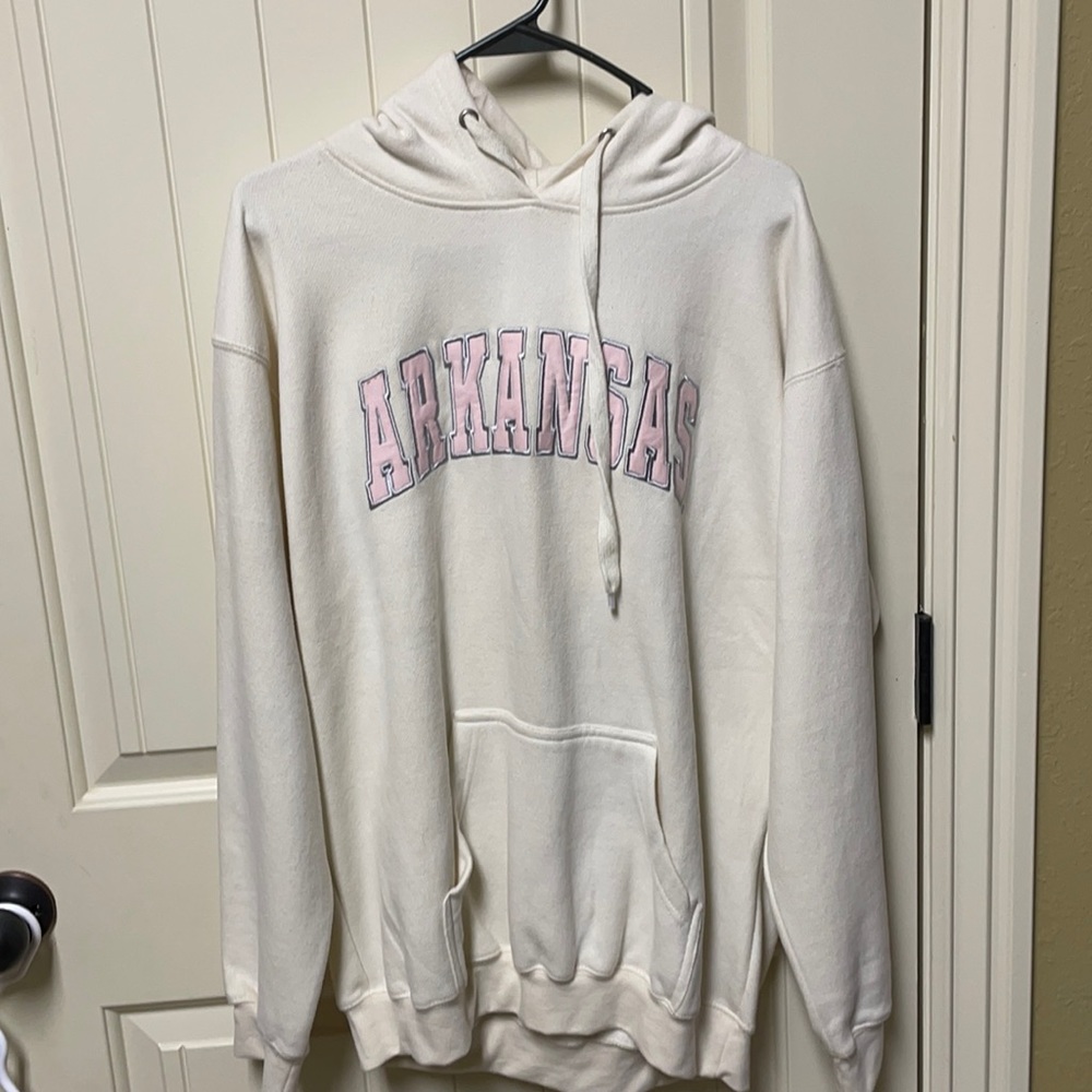 Cream with pink writing